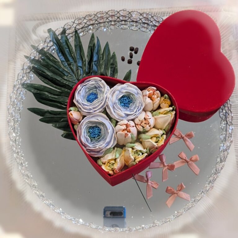 Medium 7-inch red heart box with blue and white marshmallow roses and peach tulips