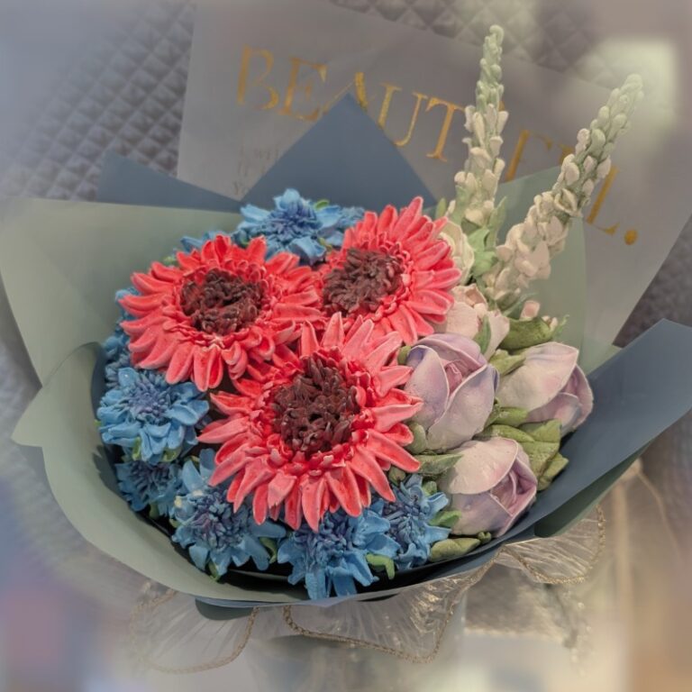 Handmade bouquet of red marshmallow roses and flowers