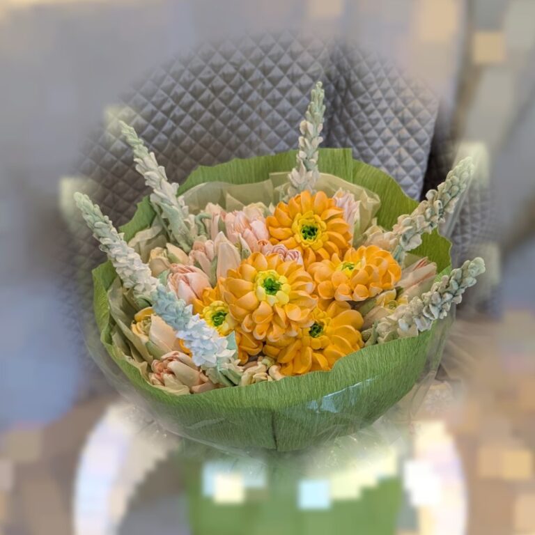 Sunny orange and yellow marshmallow flower arrangement