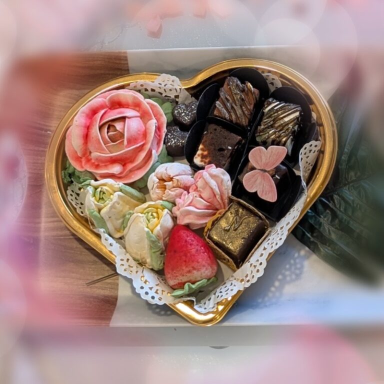 Heart-shaped gift box with marshmallow flowers and Bird's Milk candies